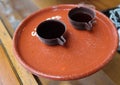 Traditional Obidos dessert drink Ginja aka Ginjinha in the chocolate cups, Obidos, Portugal Royalty Free Stock Photo