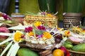 Traditional offerings to gods in Indonesia with flowers, fruits and aromatic sticks in temple, buddhist Royalty Free Stock Photo