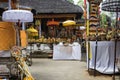 Traditional offerings to gods in Indonesia with flowers, fruits and aromatic sticks in temple, buddhist Royalty Free Stock Photo