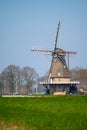 Traditional old Dutch wind mill in North Brabant Royalty Free Stock Photo