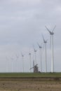 Traditional old dutch windmill goliath and wind turbines near eemshaven in the northern province groningen of the netherlands Royalty Free Stock Photo