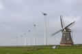 Traditional old dutch windmill goliath and wind turbines near eemshaven in the northern province groningen of the netherlands Royalty Free Stock Photo