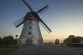 Traditional Old dutch windmill in Latvia. Sunrise to Araisi windmill in Vidzeme Royalty Free Stock Photo