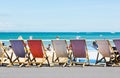 Traditional old fashion wooden deck chairs along promenade in Weymouth Royalty Free Stock Photo