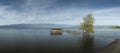 Traditional old fishing hut and wooden pier at Lake Dojran Royalty Free Stock Photo