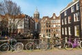 Traditional old houses, canal, bridge, bikes in Amsterdam, Netherlands