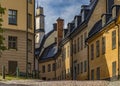 Traditional old houses and cobblestone road in Stockholm city center, the old town part of Sodermalm, Sweden Royalty Free Stock Photo