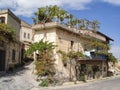 Traditional old houses and narrow streets in the center of Uchisar - popular tourist destination in Cappadocia, Turkey