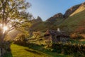 Traditional old irish house on mountain view of the sky on sunrise hidden village of galboly abandon rural irish cottage Royalty Free Stock Photo