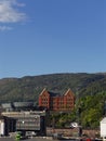 Traditional Old Norwegian Building set back on the Hillside overlooking Bergen Port Royalty Free Stock Photo