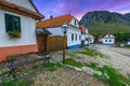 Traditional old rural whitewashed houses at sunrise Rimetea Transylvania Romania