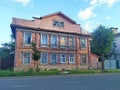 Traditional old wooden house with hand carved windows landmark in Kostroma, Russia.