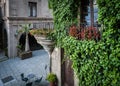 Traditional old Spanish street with beautiful balconies and arches in Barcelona town, Spain Royalty Free Stock Photo