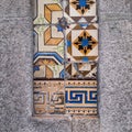 Traditional old tiles wall on the street Portuguese painted tin-glazed, azulejos ceramic tilework.