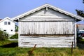 Traditional Old Weathered Beach Hut Against A Blue Sky Royalty Free Stock Photo