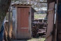 Traditional old wooden outhouse in the garden Royalty Free Stock Photo