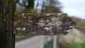 Traditional Old Wooden Public Footpath Sign in English countryside Royalty Free Stock Photo