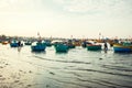 Traditional old wooden Vietnamese boats and round fishing boats