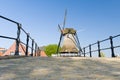 Traditional old wooden windmill in Holland Royalty Free Stock Photo