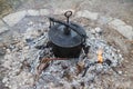 One pot dish done in a cast iron cauldron Royalty Free Stock Photo