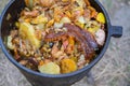 One pot dish done in a cast iron cauldron Royalty Free Stock Photo