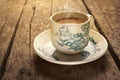Traditional oriental Chinese kopitiam style dark coffee in vintage mug