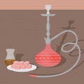 Traditional oriental hookah with turkish tea and delights. East nargile shop or shishe lounge