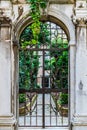 Old ornate gate in a narrow street in Venice Italy Royalty Free Stock Photo