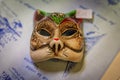 Traditional ornate Venetian carnival cat mask on display at a craftsman workshop studio and store in Venice, Italy Royalty Free Stock Photo
