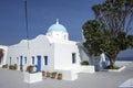 Traditional Orthodox blue dome church in Greece on a sunny summer day, with the typical blue and white colours. Santorini, Royalty Free Stock Photo