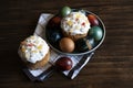 Traditional Orthodox Easter bread the kulich, russian food, religion, painted eggs, candle.Flat lay. Royalty Free Stock Photo