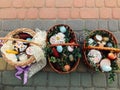 Traditional orthodox Easter food for blessing. Easter baskets with stylish painted eggs, easter cake, ham,beets, butter, candle