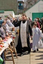 Traditional orthodox paschal ritual - priest blessing people, ea