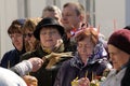 Traditional orthodox paschal ritual - priest blessing people wit