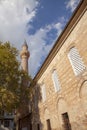 Traditional ottoman architecture mosque, blue sky, clouds and tree Royalty Free Stock Photo