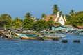 Traditional outrigger canoes moored in a tributary to the lagoon in Negombo, Sri Lanka Royalty Free Stock Photo