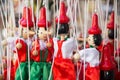Traditional painted red and green wooden Pinocchio marionette dolls Italy Royalty Free Stock Photo