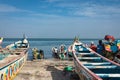 Traditional painted wooden fishing boat in Djiffer, Senegal. West Africa