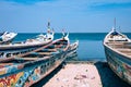 Traditional painted wooden fishing boat in Djiffer, Senegal. West Africa Royalty Free Stock Photo