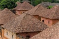 Traditional palace of the Fon of Bafut with brick and tile buildings and jungle environment, Cameroon, Africa