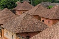 Traditional palace of the Fon of Bafut with brick and tile buildings and jungle environment, Cameroon, Africa Royalty Free Stock Photo