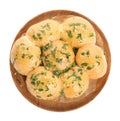 Traditional pampushka buns with garlic and herbs on white background, top view Royalty Free Stock Photo