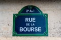 Traditional Parisian street sign with \'Rue de la Bourse\' written on it, Paris, France