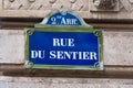 Traditional Parisian street sign with \