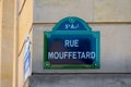 Traditional Parisian street sign with \