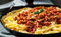 Traditional pasta spaghetti bolognese in a frying pan Royalty Free Stock Photo