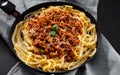 Traditional pasta spaghetti bolognese in a frying pan Royalty Free Stock Photo