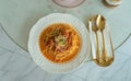 Traditional pasta spaghetti bolognese in white plate on pink table background. Appetizing spaghetti rolled with typical Italian Royalty Free Stock Photo