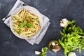 Traditional pasta trofie south of Italy with pesto and basil. Homemade meal for lunch. Healthy, tasty, meat-free food Royalty Free Stock Photo