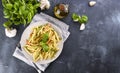 Traditional pasta trofie south of Italy with pesto and basil. Homemade meal for lunch. Healthy, tasty, meat-free food Royalty Free Stock Photo